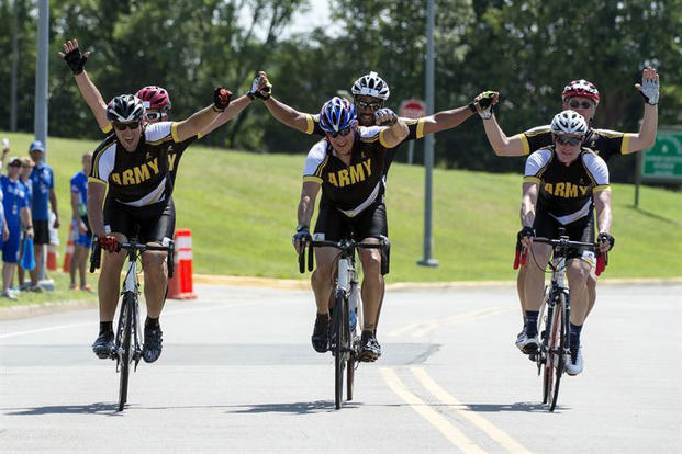 Army visually impaired cycling teams finish together to take gold, silver and bronze medals during the 2015 Department of Defense Warrior Games on Marine Corps Base Quantico, Virginia, June 21, 2015. (Photo: EJ Hersom)