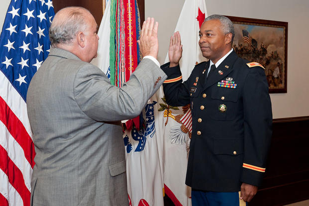 Col. Maurice "Mo" Stewart receives the oath of office administered by Under Secretary of the Army Joseph W. Westphal (U.S. Army/Sgt. Laura Buchta)