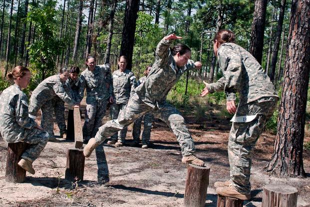 Soldiers negotiate obstacles during the Cultural Support Assessment and Selection program. (Staff Sgt. Russell Klika/U.S. Army)