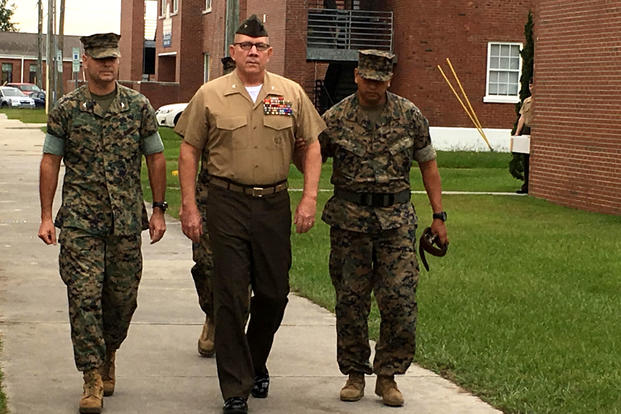 Col. Daniel Wilson, center, was fired as operations officer for II Marine Expeditionary Force in Camp Lejeune, N.C., amid allegations of child sex assault. (Military.com photo/Hope Hodge Seck)