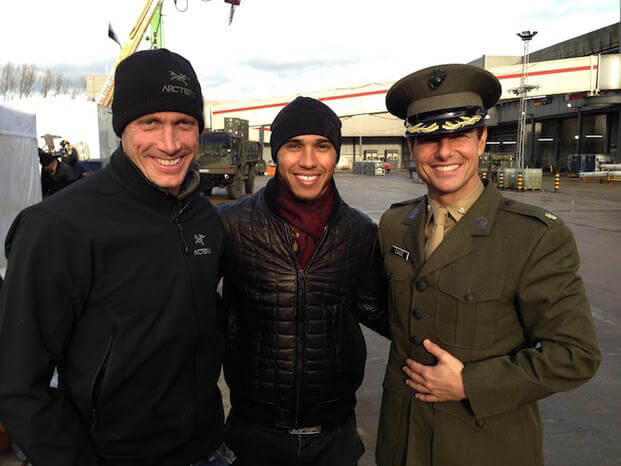 Wade Eastwood and Tom Cruise with an unidentified person on the set of Edge of Tomorrow.