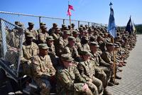 FILE -- Soldiers from 1st Armored Brigade Combat Team, 3rd Infantry Division observe the casing of the brigade colors during a ceremony at Hohenfels Training Area, Germany September 15, 2015 (U.S. Army/ Spc. Ryan Tatum)