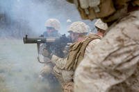 U.S. Marine Corps Lance Cpl. David Coker, center, assaultman, Alpha Company, 1st Battalion, 2nd Marine Regiment, 2nd Marine Division (MARDIV), fires a shoulder-launched multipurpose assault weapon during a platoon live fire attack as part of a deployment for training exercise on Fort A.P. Hill, Va., April 22, 2015. (U.S. Marine Corps photo/Alexander Hill)