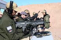 Man tests the IWI US Tavor 7 rifle chambered for 7.62mm at range day during SHOT Show 2018. (Matthew Cox/Military.com)