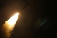 The guided-missile cruiser USS Monterey (CG 61) fires a Tomahawk land attack missile April 13. Monterey is deployed to the U.S. Fifth Fleet area of operations in support of maritime security operations to reassure allies and partners, and preserve the freedom of navigation and the free flow of commerce in the region. (DoD)