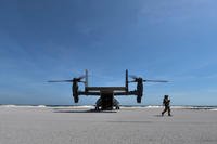 Staff Sgt. Nicholas Tinney, a flight engineer with the 8th Special Operations Squadron, departs a CV-22 Osprey following a training mission with the Secretary of the Air Force Heather Wilson at Eglin Range, Fla., May 3, 2018. (U.S. Air Force photo/Ryan Conroy)