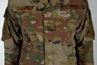 The Air Force is adopting the Army's Operational Camouflage Pattern for its new combat uniform and began incrementally phasing it in Oct. 1. The Air Force will differentiate itself by using a "spice brown color" for velcro patches, name tape and insignia. Air Force photo