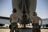 U.S. Air Force KC-135 Stratotanker maintainer assigned to the 28th Expeditionary Air Refueling Squadron at Al Udeid Air Base, Qatar, inspect the flaps on the wings prior to the engine start Sept. 1, 2018. (U.S. Air Force/Senior Airman Xavier Navarro)