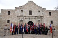 Thirty service members, representing the Army, Navy, Marine Corps and Air Force stand before The Alamo on March 6, 2010, commemorating the battle that took place there in February and March of 1836 for Texan independence from Mexico. (US Army photo/Esther Garcia)
