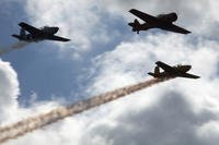 Two T-34 Mentor and a SNJ Texan perform with the Training Parade during the 2012 Marine Corps Air Station Miramar Air Show Oct. 12, 2012. (U.S. Marine Corps photo/Melissa Lee)