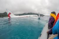 U.S. Sailors assigned to Underwater Construction Team (UCT) 2 assist in rescuing the passengers and crew of Air Niugini flight PX56 following the plane ditching into the sea on its approach to Chuuk International Airport in the Federated States of Micronesia, Sept. 28, 2018. (U.S. Navy /Lt. Zach Niezgodski)