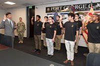 In an undated photo, former Secretary of the Army Dr. Mark T. Esper swears in new recruits at the Baltimore MEPS station at Fort George G. Meade. (Staff Sgt. Brandy N. Mejia/U.S. Army)