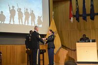 U.S Army Cpl. Hala Kadhem, a unit supply specialist assigned to the 2nd Infantry Brigade Combat Team, 4th Infantry Division, receives her diploma after graduating from Advanced Individual Training at Fort Lee, Virginia, November 1, 2018. (Courtesy photo)