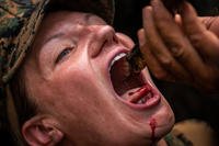 A U.S. Marine drinks the blood of a king cobra as part of jungle survival training during exercise Cobra Gold at Ban Chan Krem, Feb. 14, 2019, in Chanta Buri, Kingdom of Thailand. (Matthew J. Bragg/Marine Corps)