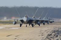 F-22 Raptors from the 1st Fighter Wing and 192nd Fighter Wing participate in a total force exercise at Joint Base Langley-Eustis, Virginia, on Feb. 28, 2019. Both wings partnered with the 633rd Air Base Wing during the Phase I exercise to showcase the readiness and deployability of the F-22s. (U.S. Air Force photo by Tech Sgt. Carlin Leslie)