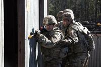 Infantrymen prepare to enter a building during a squad training exercise, at Fort Stewart, Ga., Jan. 16, 2019. (U.S. Army Photo/Spc. Jordyn Worshek)