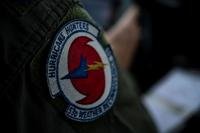 The Hurricane Hunter patch on the right arm of Major Stephen Pituch who is pilot that flies the Hurricane hunter mission out of Savanah Air National Guard Base, Savanah, Georgia, Airport, September 12, 2018. The U.S. Air Force Reserve 53rd Weather Reconnaissance Squadron or Hurricane Hunters is conducting a storm tasking mission into Hurricane Florence, currently a category 4 storm. The tasking provides critical and timely weather data for the National Hurricane Center to assist in providing up-to-date and 
