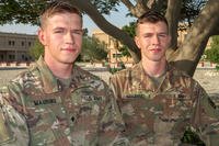 Army Spc. Joseph Maurino, left, and his identical twin brother, Pvt. Matthew Maurino, are currently deployed together to Camp As Sayliyah, Qatar. Both the Manalapan, New Jersey, natives are infantryman with the New Jersey Army National Guard's 1st Battalion, 114th Infantry Regiment. Matthew is with Alpha Company and Joseph is with Bravo Company. (U.S.Army photo/Zach Mott)