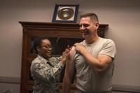 Col. Joe Kunkel, 366th Fighter Wing commander, receives an influenza shot from Senior Airman Jabreanna Fontenot, 366th Aerospace Medicine Squadron medical technician, Oct. 2, 2018, at Mountain Home Air Force Base, Idaho. (U.S. Air Force/Senior Airman Tyrell Hall)
