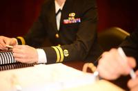 U.S. Navy Lts. Tracy Hasse, left, and Michael Hughes prepare for a court-martial at the Washington Navy Yard in Washington, D.C., March 20, 2013. (U.S. Navy/Lt. Ayana Pitterson)