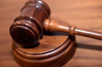 A gavel rests inside the court room.