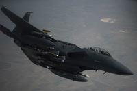 An F-15E Strike Eagle peels off from a KC-135, May 7, 2019 at an undisclosed location. (U.S. Air Force/Master Sergeant Russ Scalf)