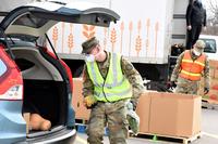 Michigan Army National Guard soldiers distribute over 20,000 pounds of food in west Michigan.