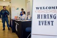 Navy sailor attends a free hiring event held for service members at Joint Base Pearl Harbor-Hickam.