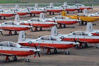 T-6B Texan II training aircraft assigned to Training Wing (TRAWING) 5 from Pensacola, Fla., are staged on the tarmac at Millington Regional Jetport after being evacuated from their home station in preparation for Hurricane Isaac. (Ty C. Connors/U.S. Navy)