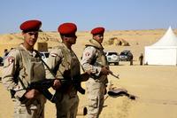 Egyptian Army soldiers stand guard in the Fayoum oasis, Egypt.