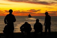 U.S. Marines and Sailors aboard the USS Essex.