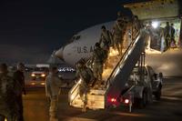 Soldiers from the Utah National Guard exit a KC-135R.