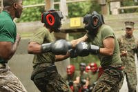 Marine recruits spar during Crucible