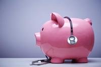 Piggy bank with a stethoscope