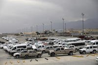 Vehicles are parked at Bagram Airfield after the American military left the base