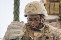 Marine with Fleet Anti-terrorism Security Team trains.