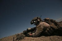 Special ops member conducts combat operations.