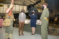 Gen. Jacqueline Van Ovost, Air Mobility Command commander, meets with three AMC Museum reenactors during her visit to Dover Air Force Base, Delaware.