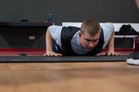 An airman does push-ups at Ramstein Air Base.