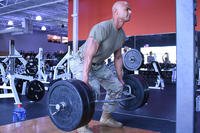 An Army staff sergeant performs a deadlift at OneLife Fitness in Frederick, Maryland.