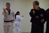 A martial arts grand master trains a private first class at Osan Air Base in South Korea.
