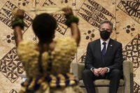 U.S. Secretary of State Antony Blinken watches a cultural farewell ceremony in Nadi, Fiji.