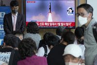 North Korea's missile launch during a news program at the Seoul Railway Station in Seoul