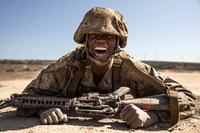 A Marine low crawls during the “Crucible” course at Camp Pendleton.