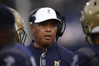 Navy head coach Ken Niumatalolo talks to players.