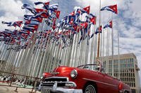 U.S. embassy as Cuban flags fly at the Anti-Imperialist Tribune