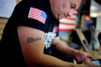 photo shows the tattoo on the right arm of U.S. veteran Hector Barajas