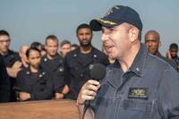 Cmdr. Theodore Essenfeld aboard the USS Pearl Harbor.