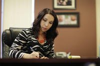 In this Aug. 2, 2017, photo, Jessica Sayles, a certified public accountant, works in her office in Las Vegas. 