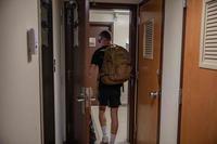 Soldier leaves room at Smoke Bomb Hill Barracks at Fort Bragg.